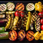 Variety of vegetables roasting on a bbq grill