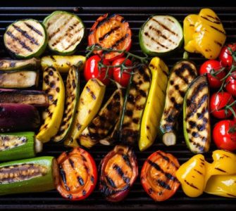 Variety of vegetables roasting on a bbq grill