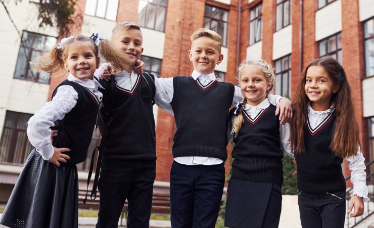 Kids Standing In Front Of School